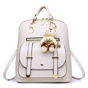 White Backpack with Bear Accessory